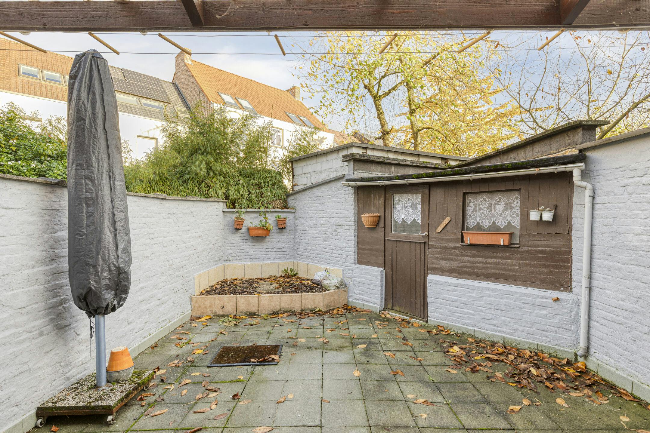 Karaktervol rijhuis met tuin te koop in Mechelen. foto 8