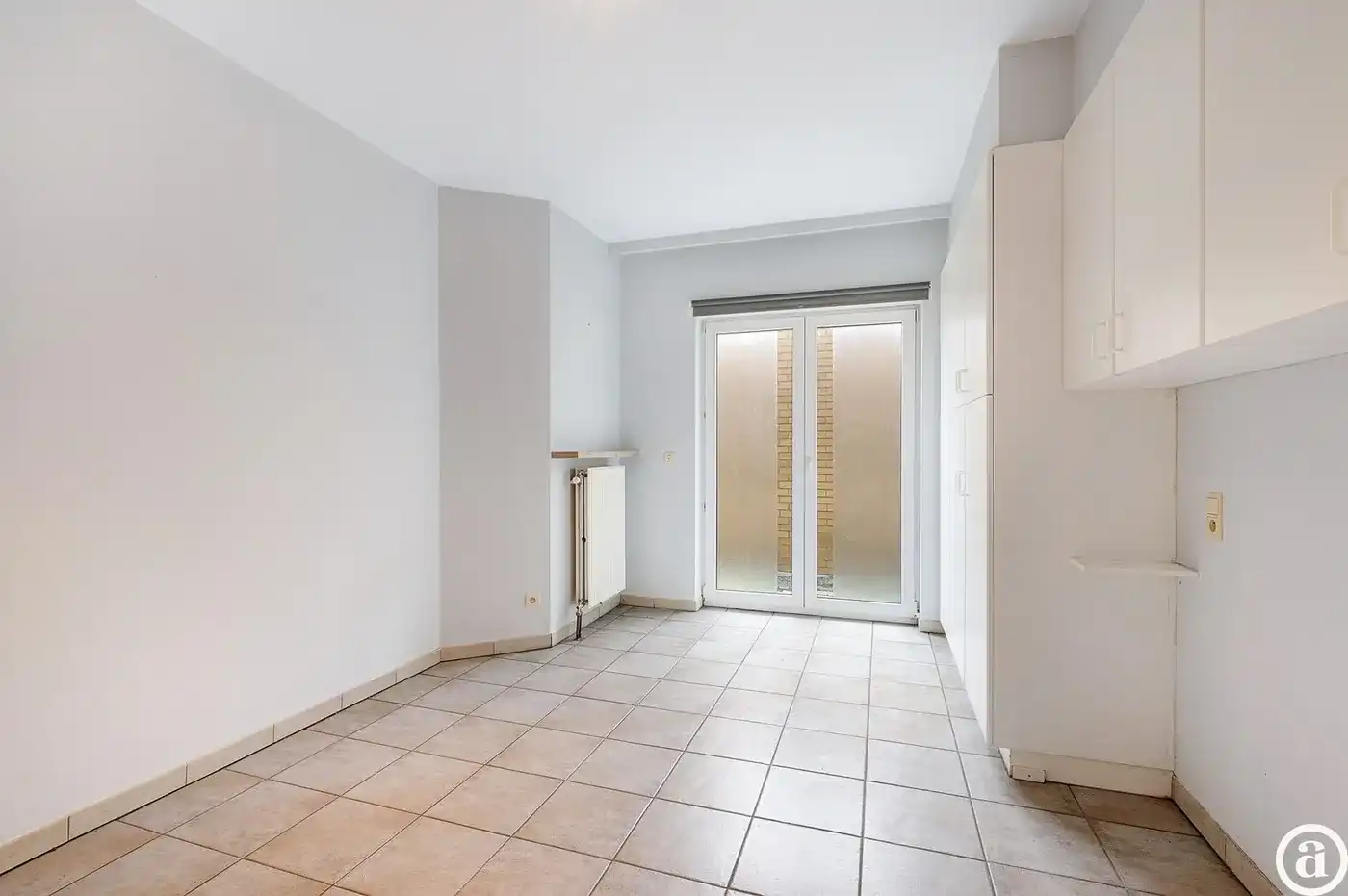 Te renoveren gelijkvloers appartement op topligging nabij het Rubensplein.  foto 15