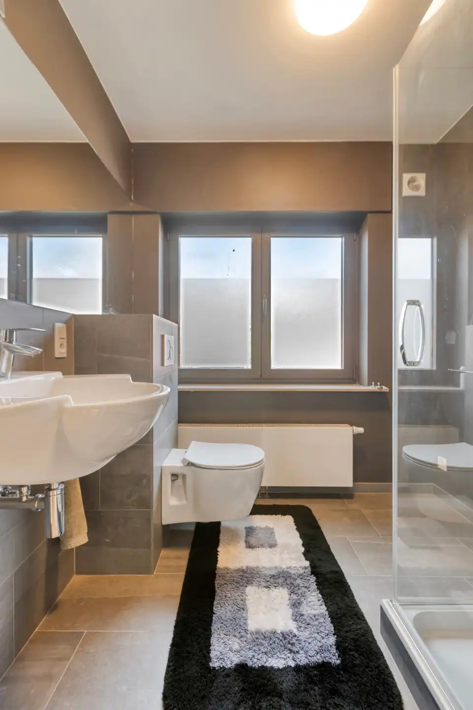 Hoogwaardig afgewerkte woning in hartje Wezemaal foto 26