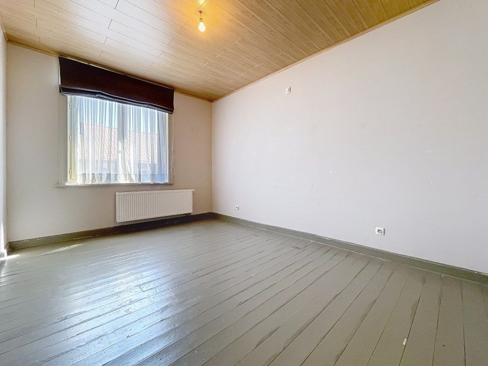Ruime woning met grote tuin en terras in het centrum foto 9