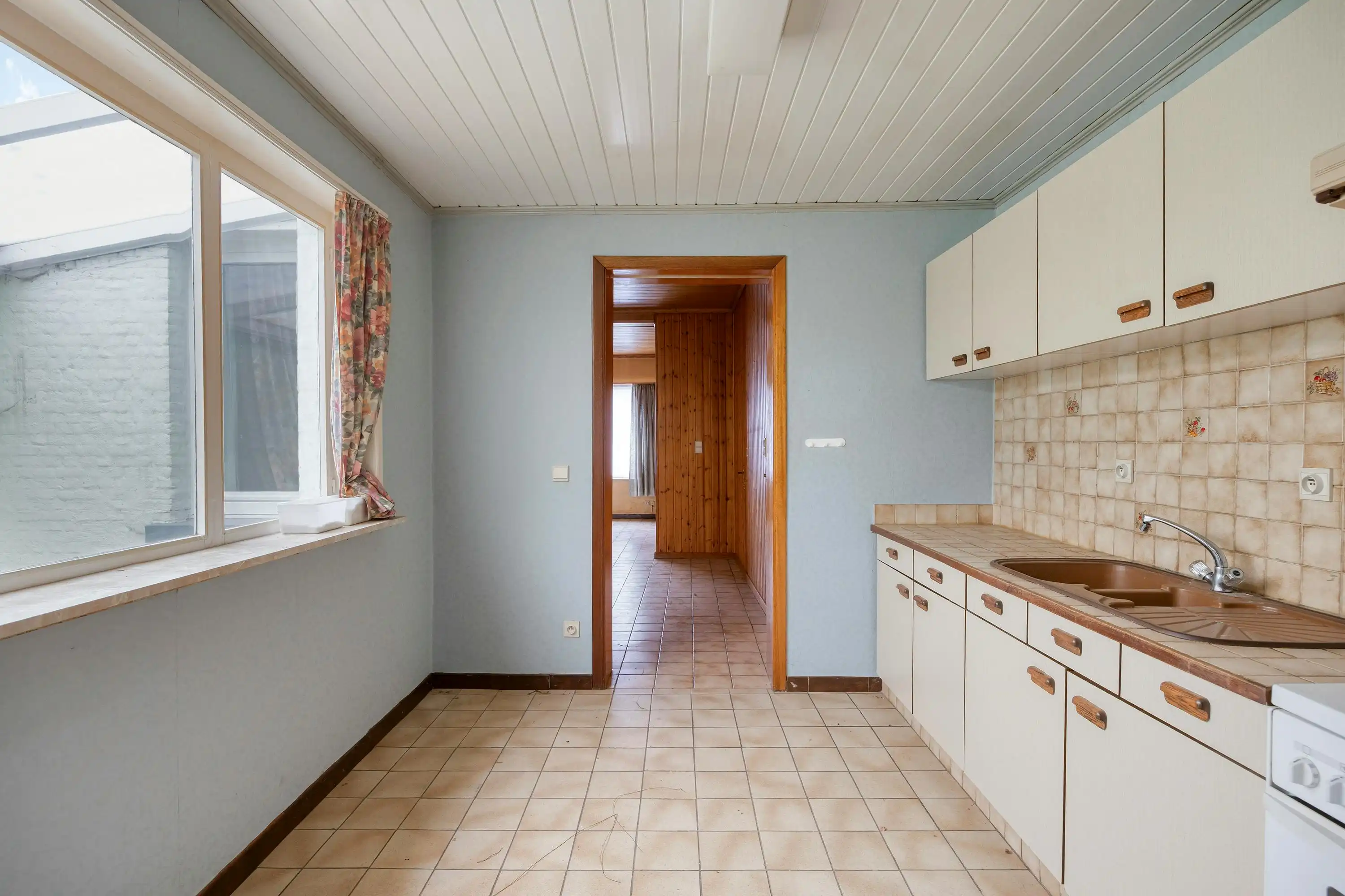 Te renoveren gezinswoning met tuin te koop in centrum Puurs foto 7