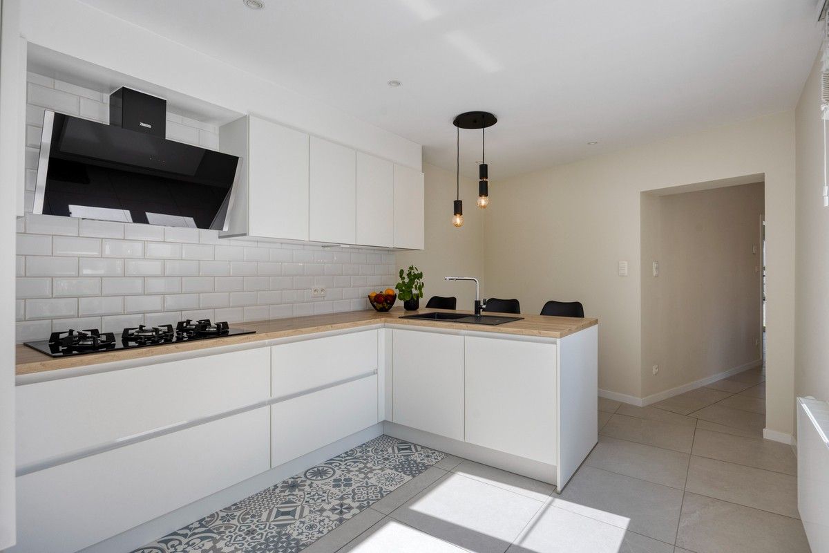 Instapklare, smaakvol gerenoveerde woning op een steenworp van het centrum van Lanaken. foto 13