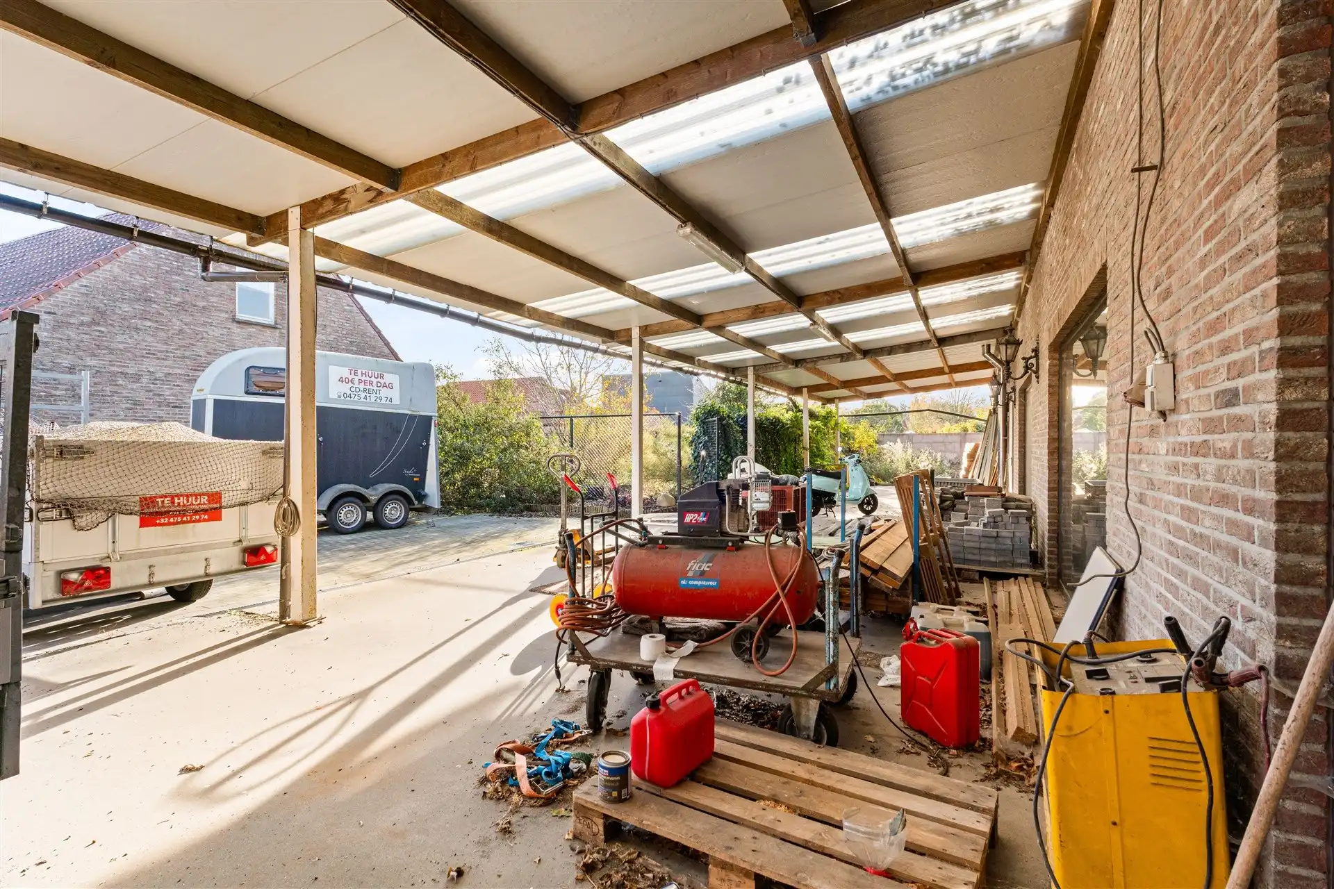 Grote grond met 2 woningen en magazijn van 700m² foto 11
