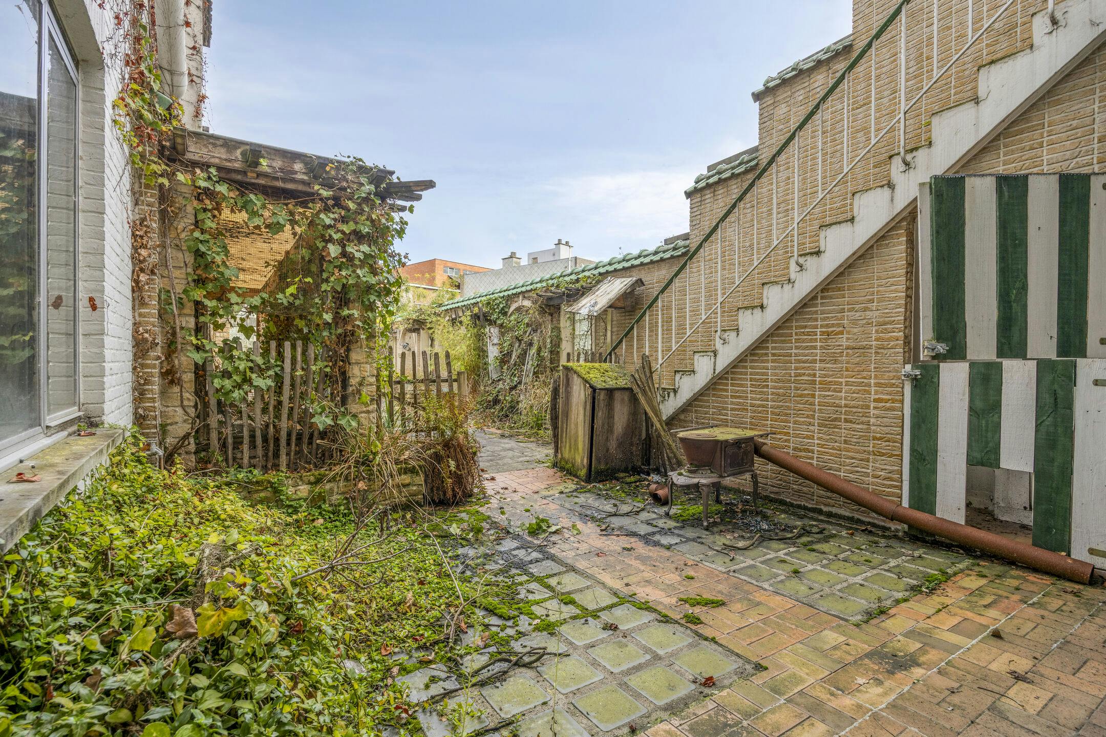 Te renoveren opbrengsteigendom met 3 appartementen en handelspand in Antwerpen foto 18