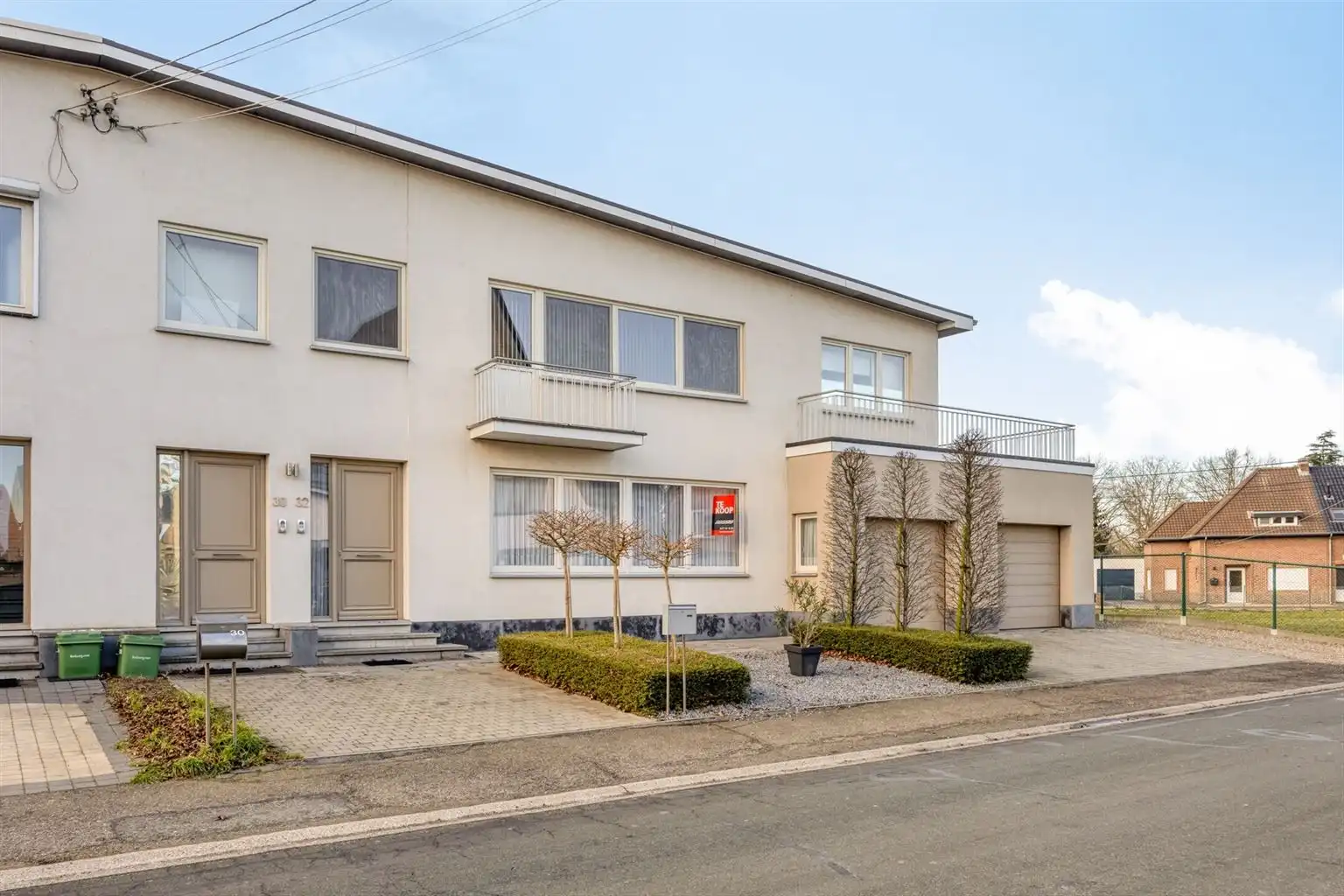 Zeer ruim 4-slaapkamerappartement met ruime terrassen en een afgesloten garage, gelegen nabij het centrum van Maaseik. foto 22