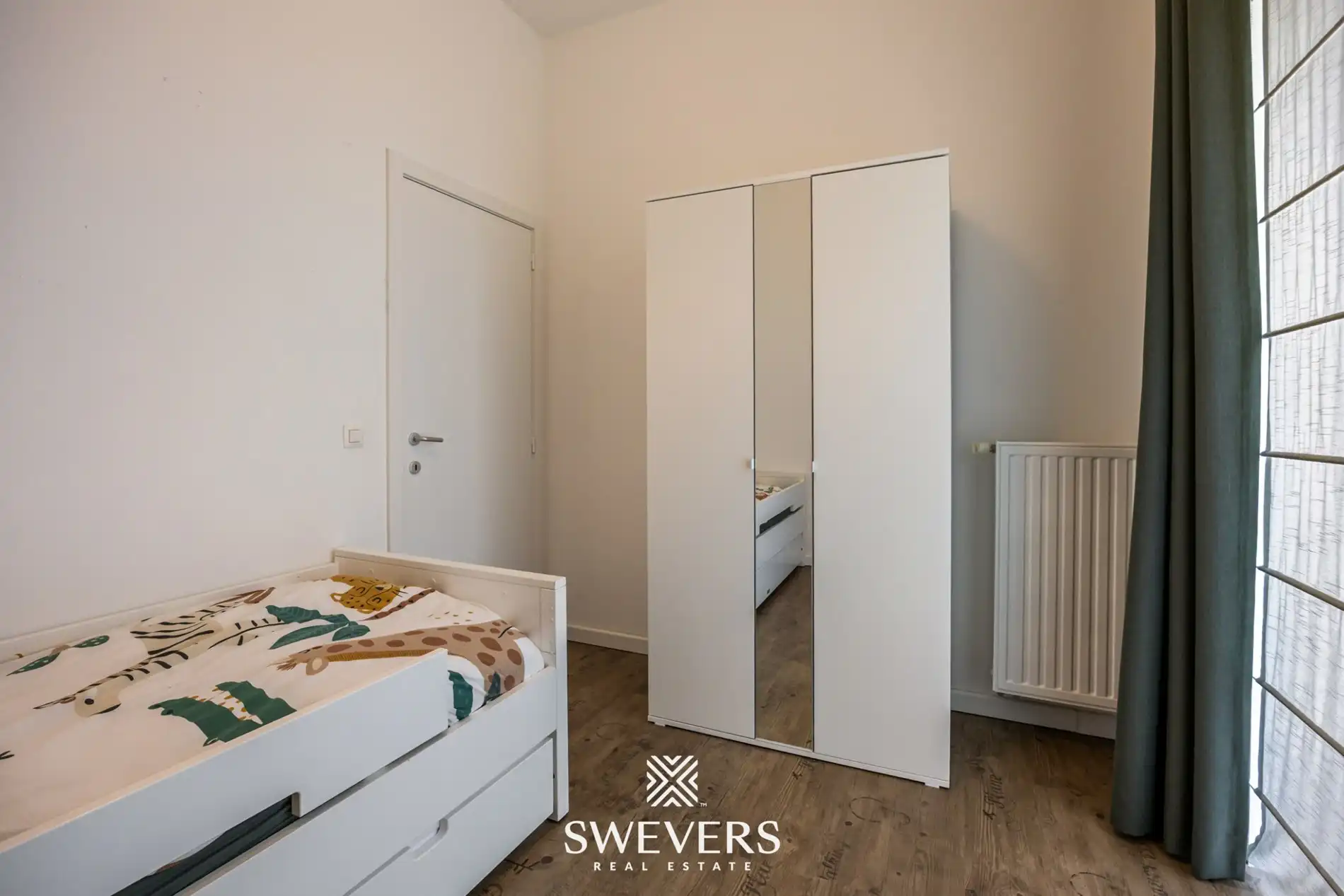 Recent en ruim gelijkvloers 3 slpk appartement met tuin en autostaanplaats nabij centrum Hasselt foto 15