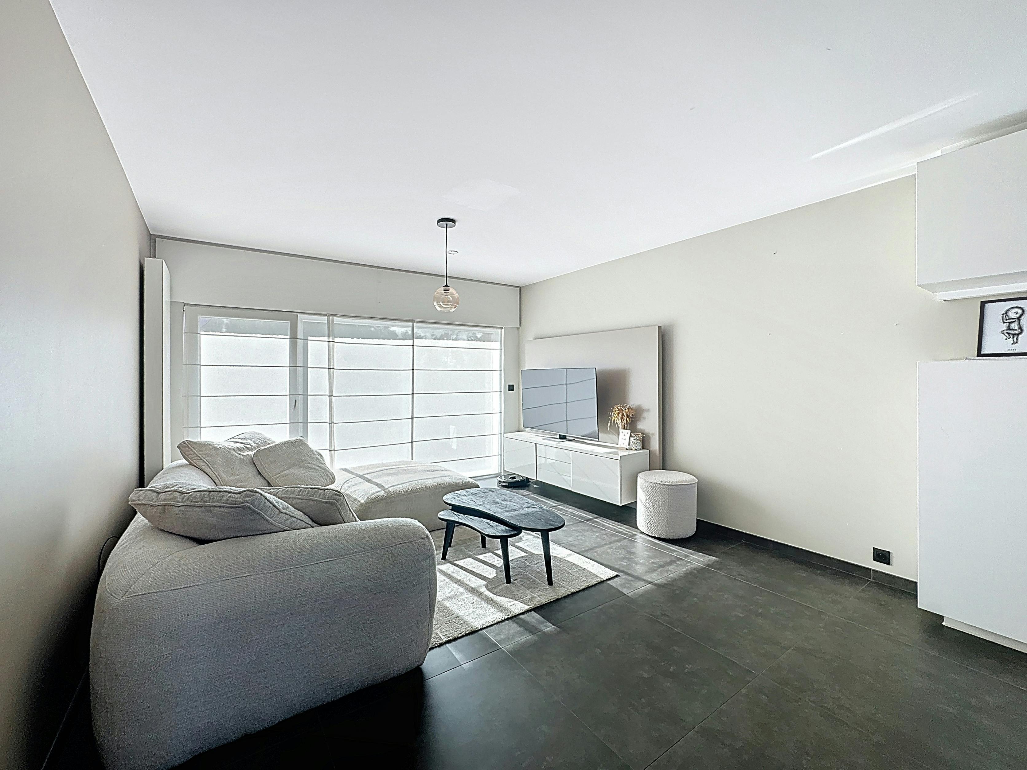 Lichtrijk en instapklaar huis met tuin te koop in Heist foto 2