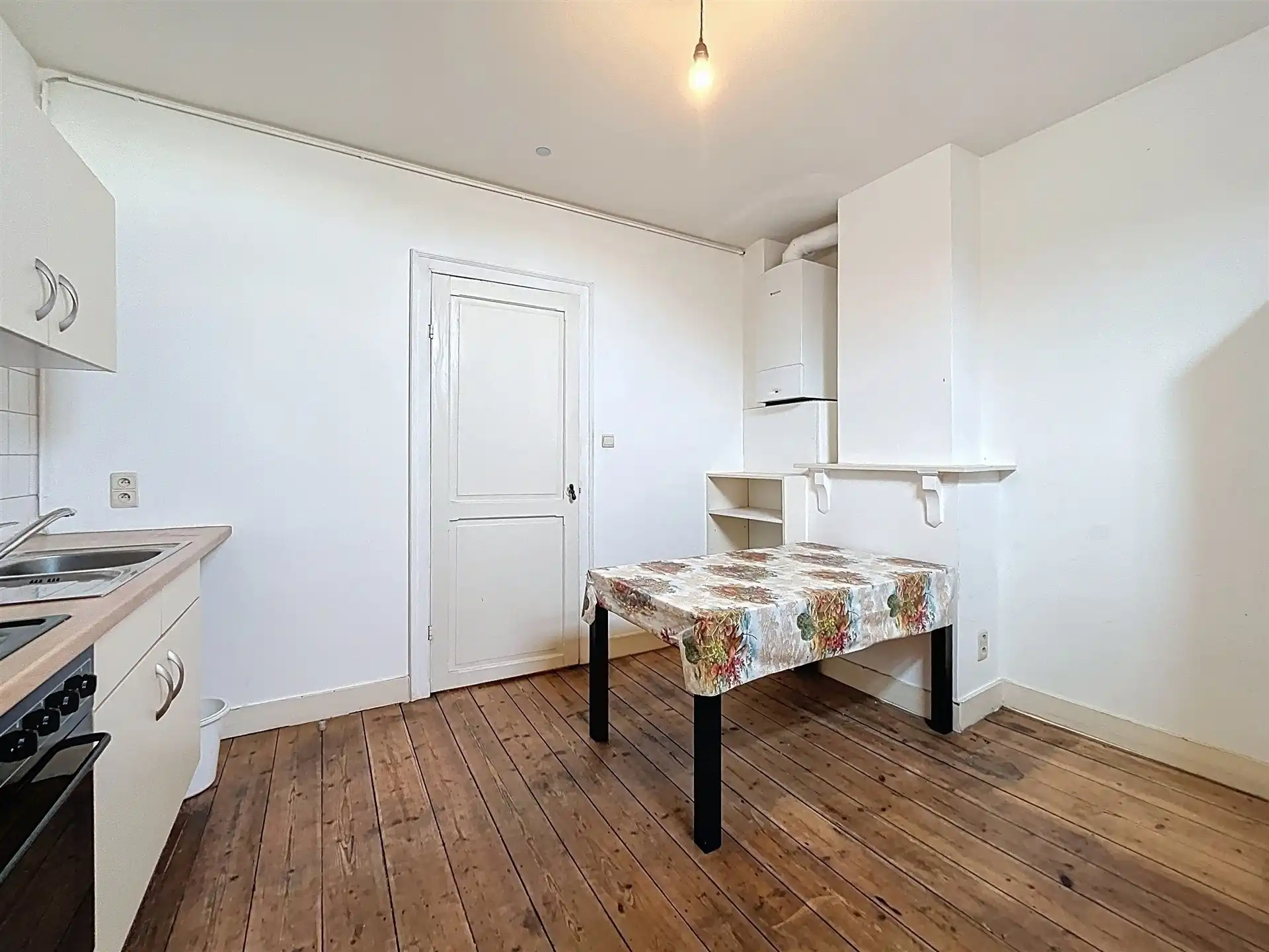 Opbrengsteigendom met 2 appartementen en een handelspand van 200 m² foto 2