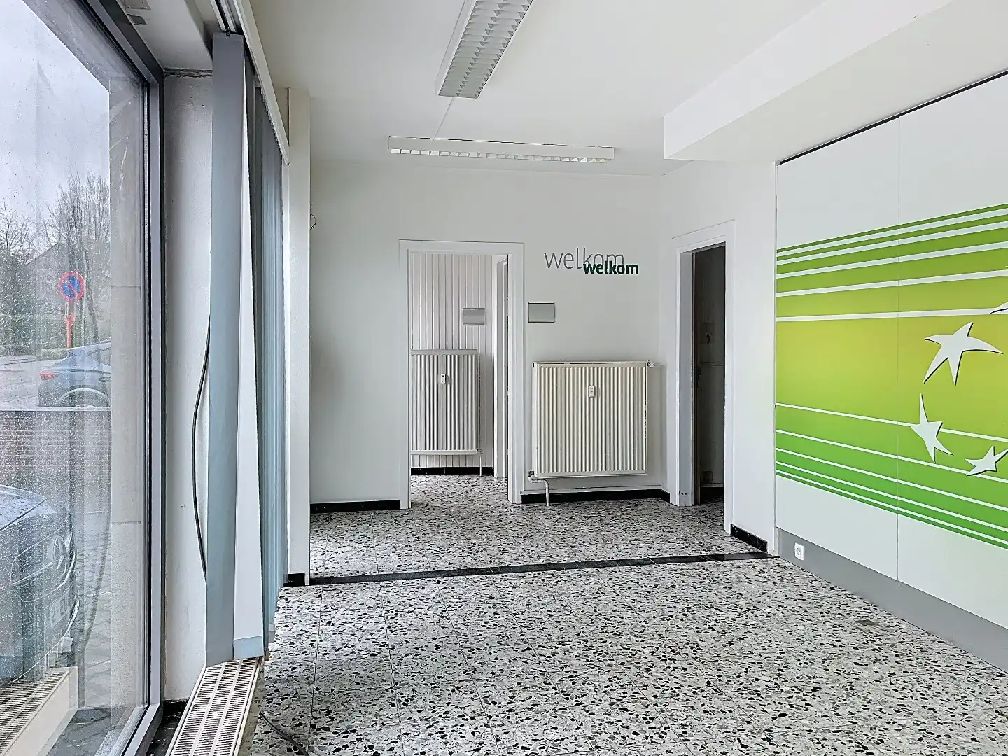 Veelzijdig pand op topligging: wonen en werken of tweewoonst met terrassen en garage foto 5