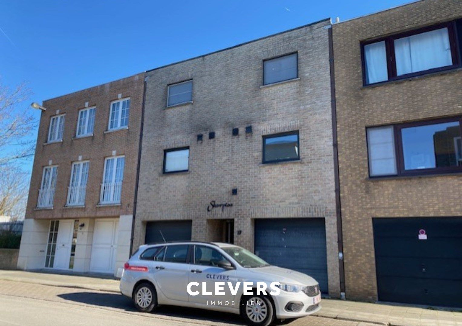 Opbrengsteigendom met 3 appartementen en 2 garages foto 2