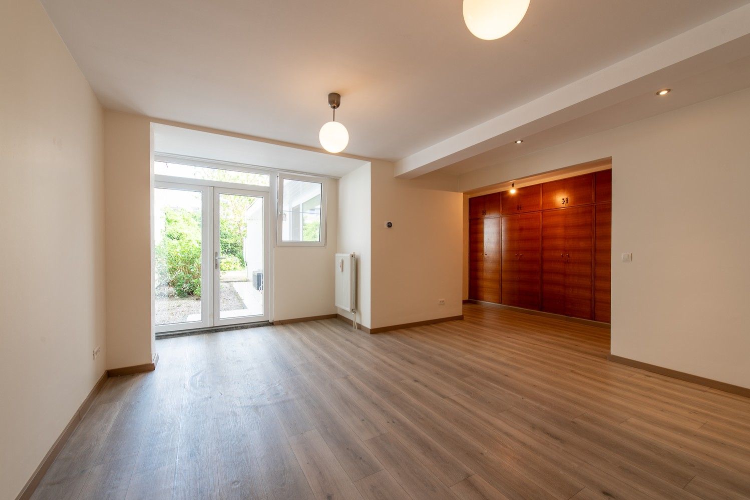 Gelijkvloers 1 slaapkamer-appartement met eigen stadstuin in hartje Genk foto 12