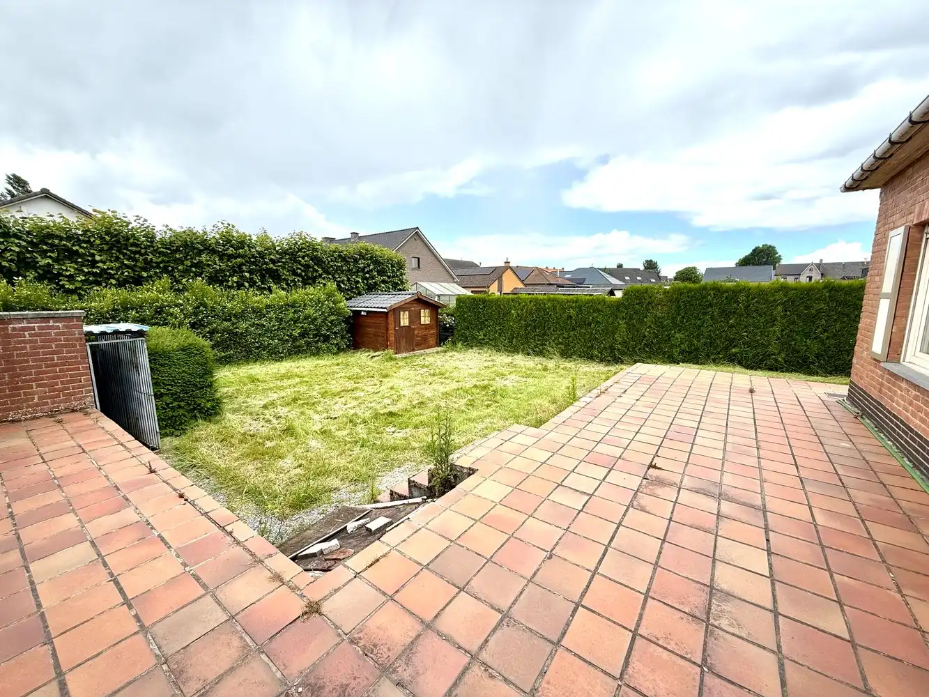 Centraal gelegen woning met veel potentieel op mooi perceel! foto 13