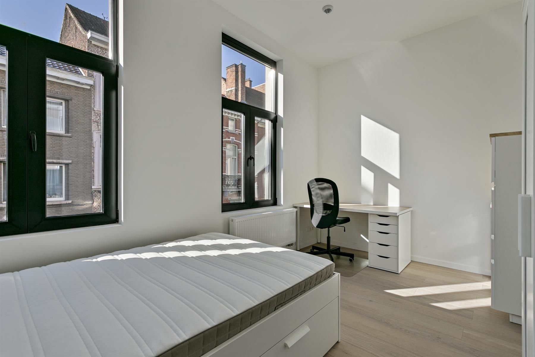 Kamer privatief sanitair in kleinschalige residentie Leuven foto {{pictureIndex}}