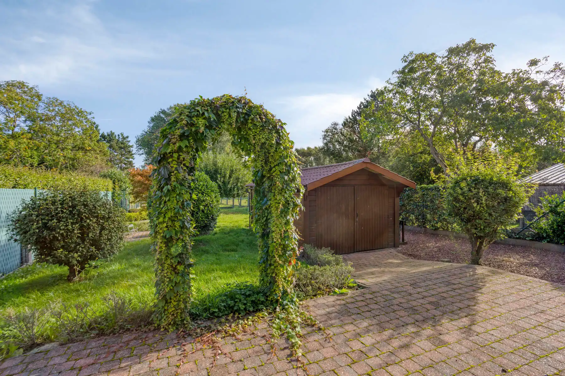Half open bebouwing met 3 slaapkamers, garage en ruime tuin! foto 21