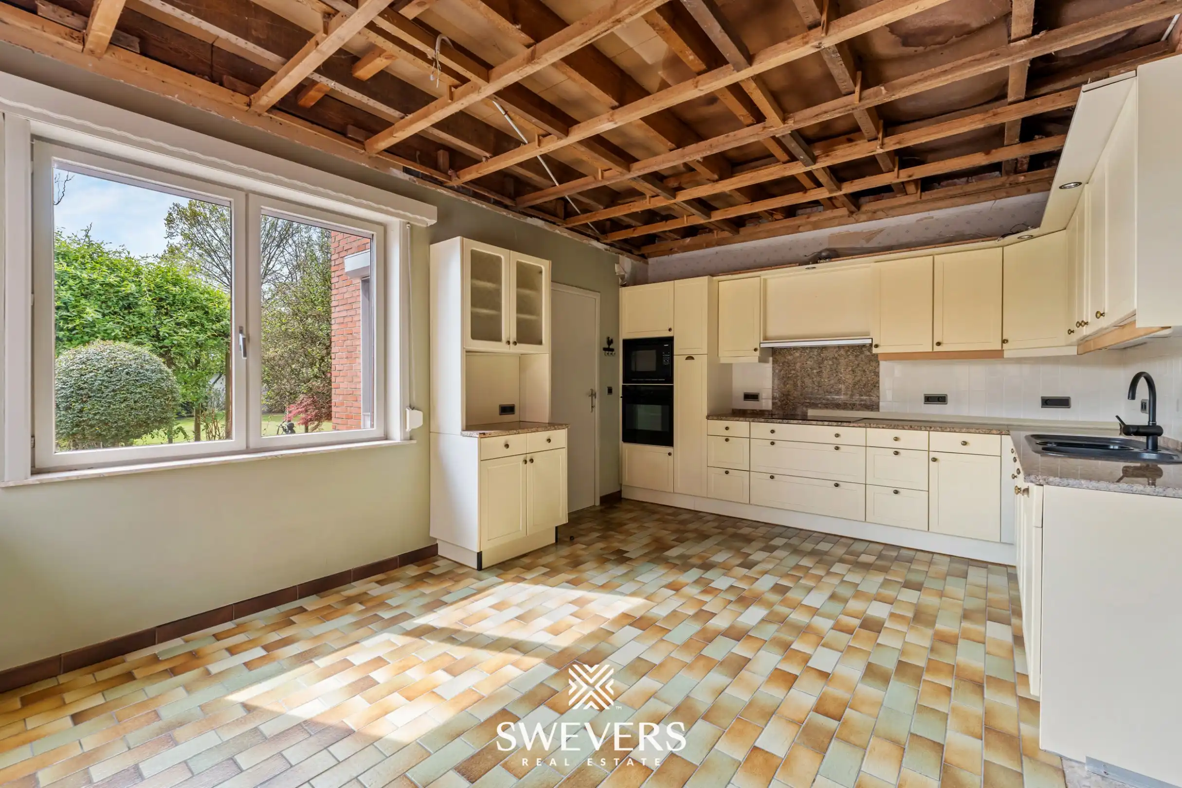 Verrassend ruime woning tot 5 à 6 slaapkamers in het centrum van Zonhoven foto 5