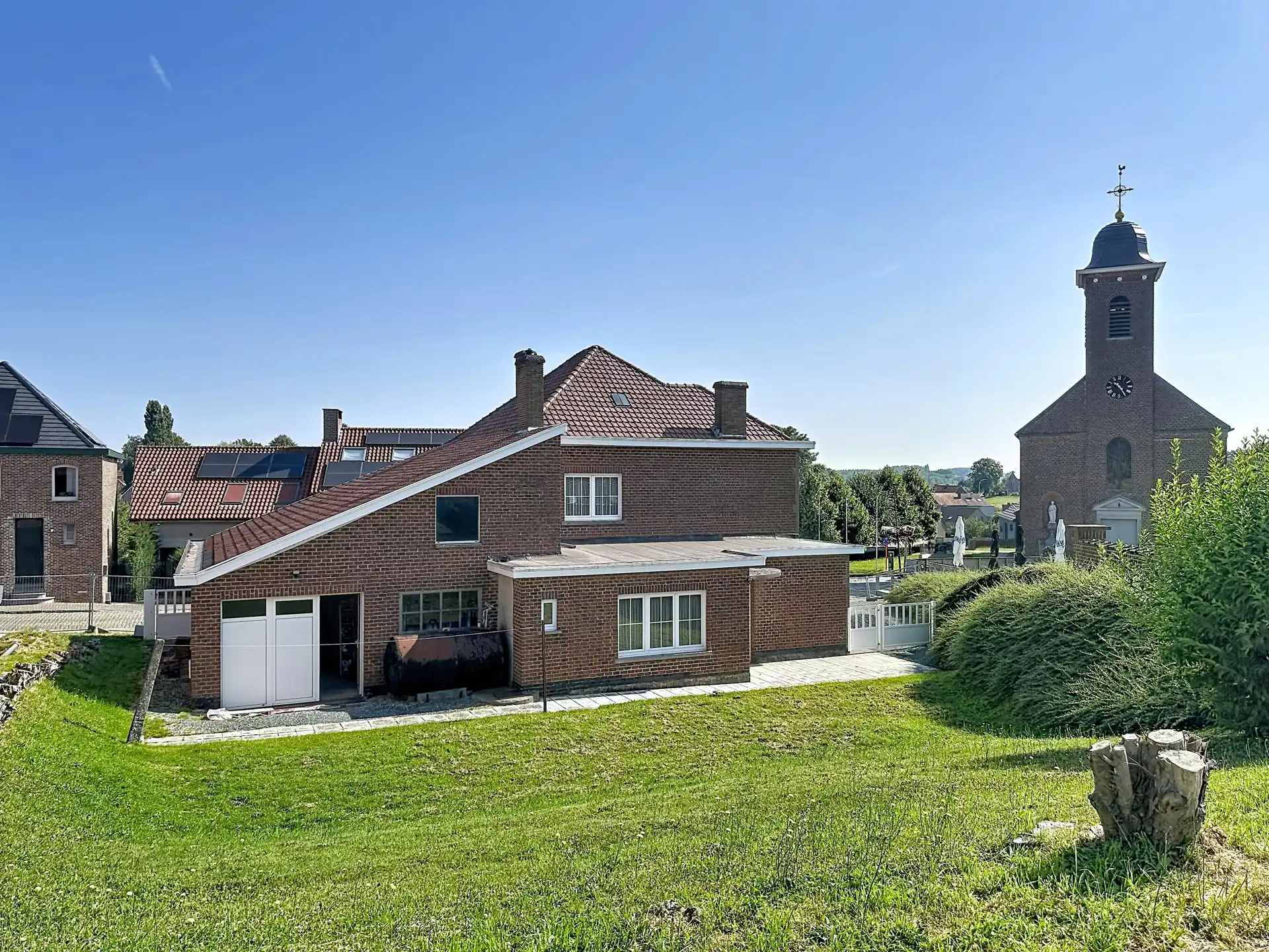 Stevige viergevel met Z-gerichte tuin en werkplaats foto 25