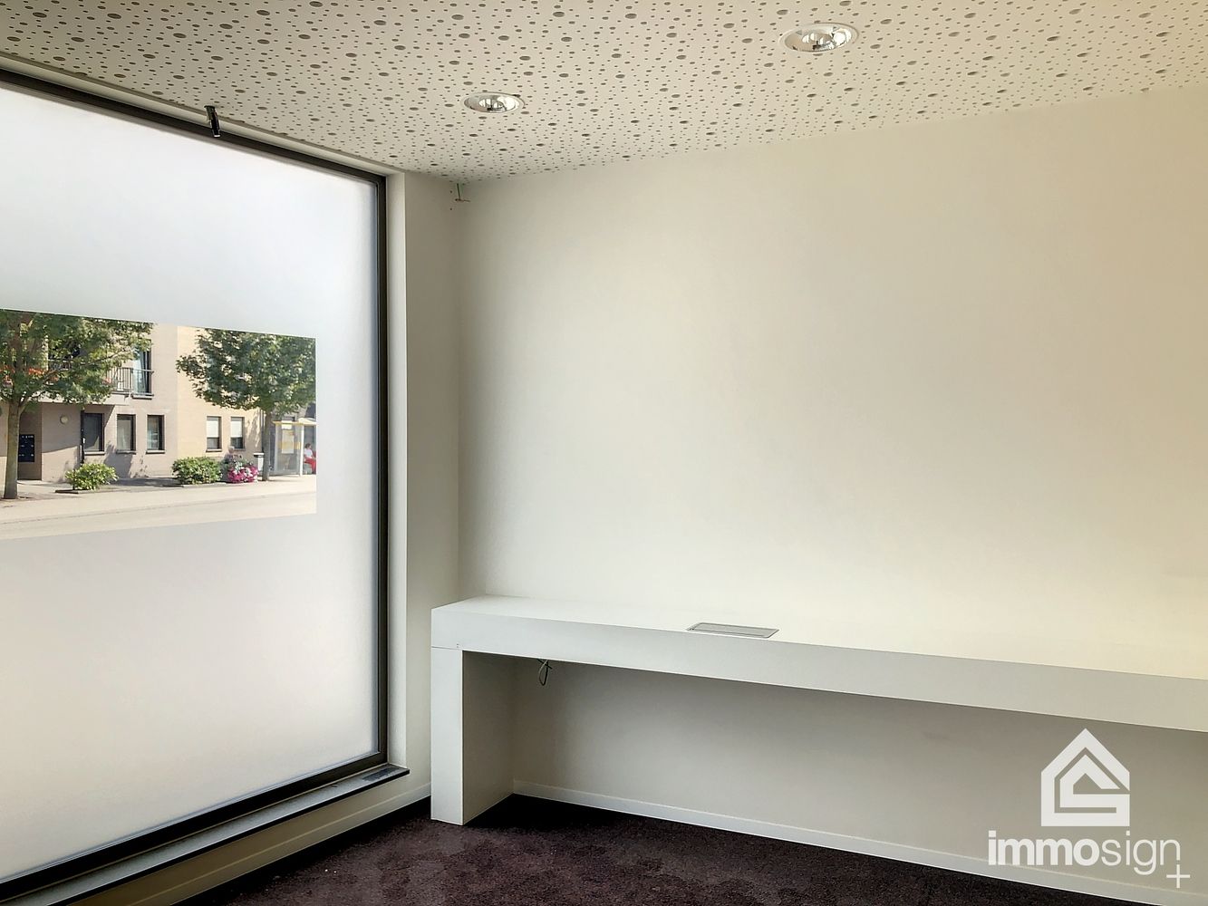 Ruime kantoorruimte met aanpalend bankcontact in het centrum van Kaulille! foto 2