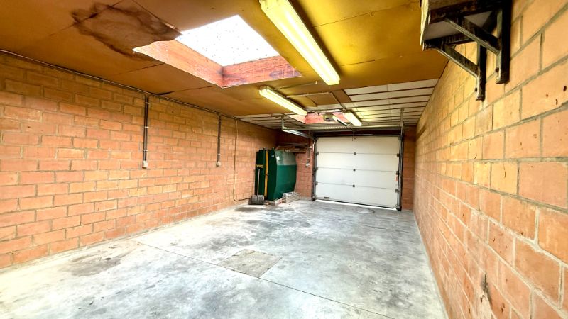 Gezellige te renoveren rijwoning met 4 kamers en garage foto 13