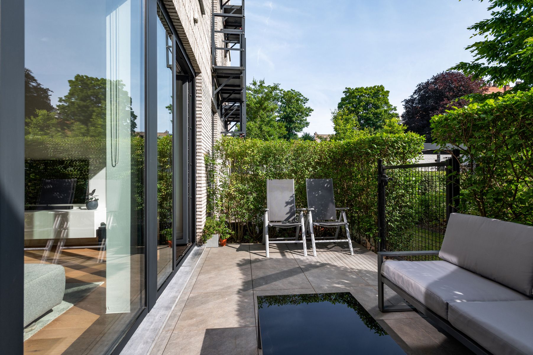Energiezuinig gelijkvloers appartement met terras en tuin foto 18