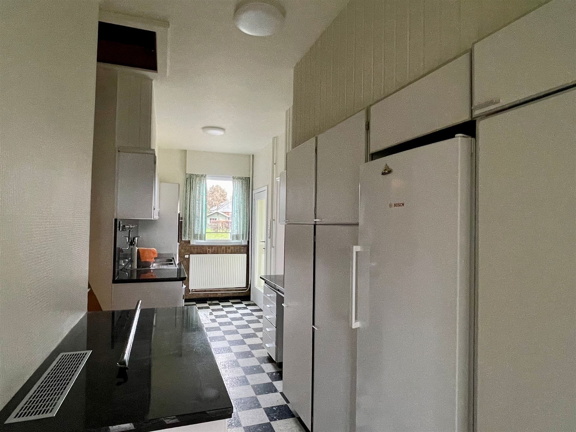 Gelijkvloerse woning foto 7