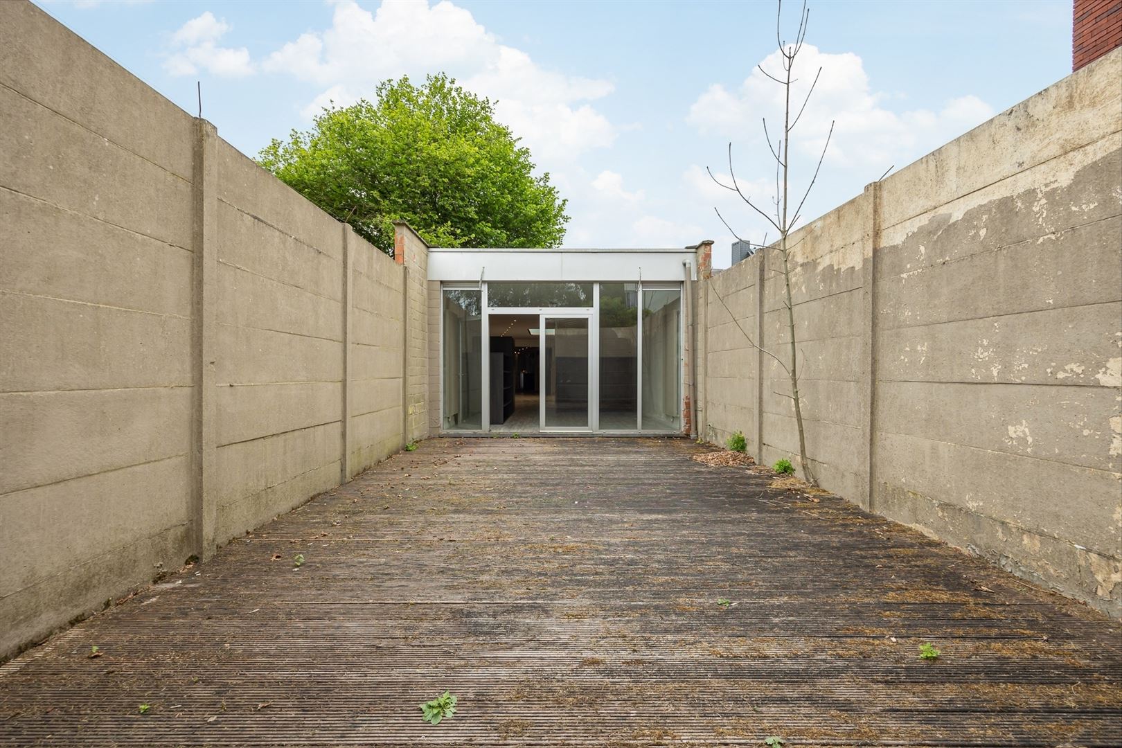 Handelshuis met ruime winkel en duplex appartement in dorp 's Gravenwezel foto 10