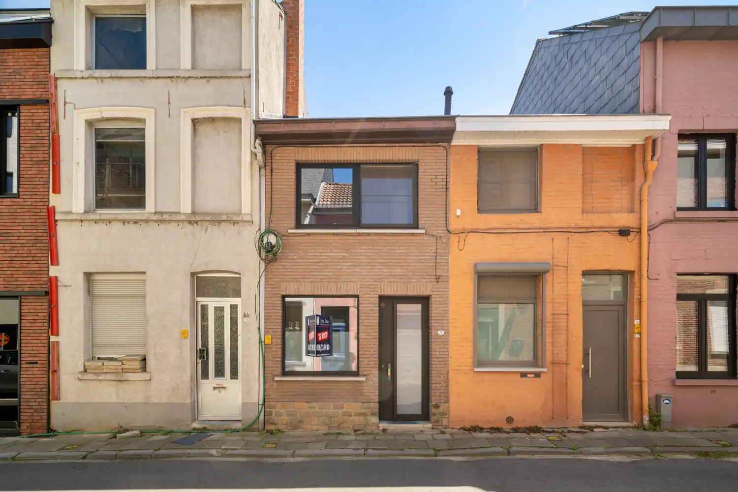 Rustig gelegen woning met 2 slaapkamers en een koer nabij het station te centrum Leuven! foto 2