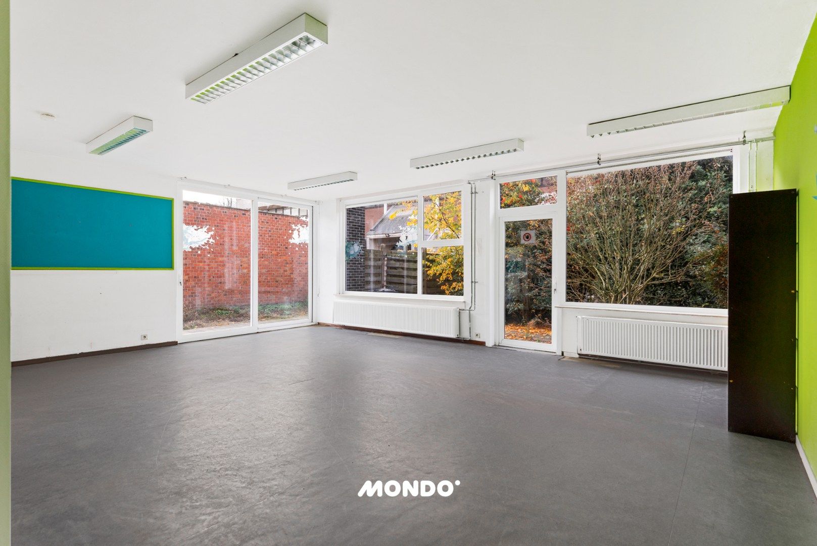 Veelzijdige praktijk- of kantoorruimte met tuin en terras nabij het centrum van Niel! foto 6