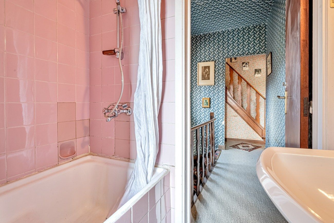 Gezellige, te renoveren, woning met charmante tuin aan een groenzone foto 23