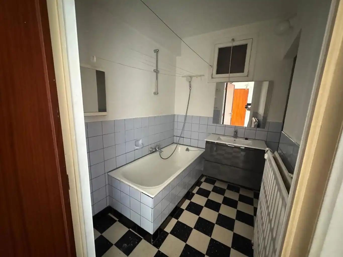 Opbrengsteigendom met 3 appartementen, tuin en 2 garages foto 12