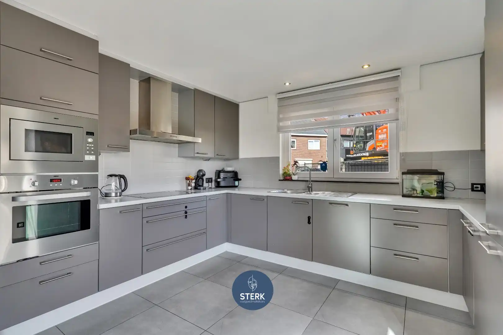 INSTAPKLARE WONING MET 3 SLPKS OP EEN CENTRALE LOCATIE TE MAASMECHELEN !  foto 10
