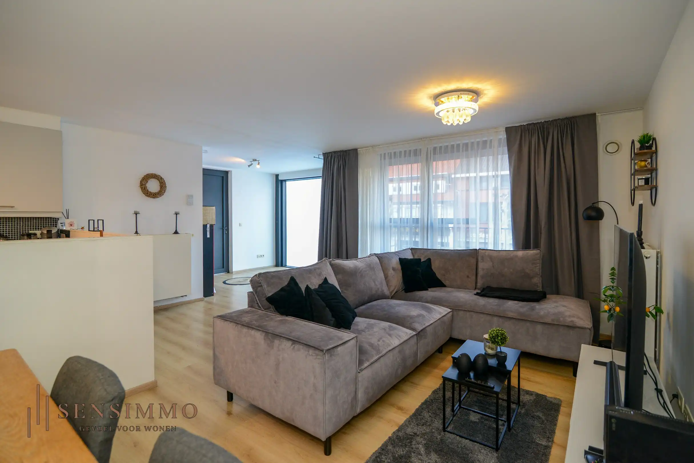 Instapklaar 2-slaapkamerappartement met dubbele terrassen en garagebox in hartje Eisden foto 7