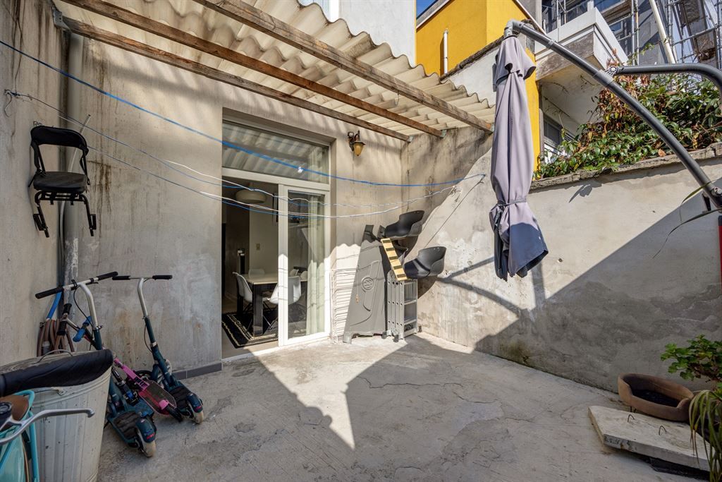 Ruime woning met 4 slaapkamers en stadskoer foto 9