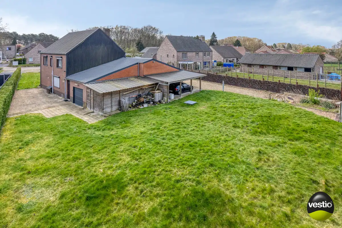 UNIEK BOUWPERCEEL VAN 16A VOOR OB MET AF TE BREKEN WONING TE ZUTENDAAL. foto 14