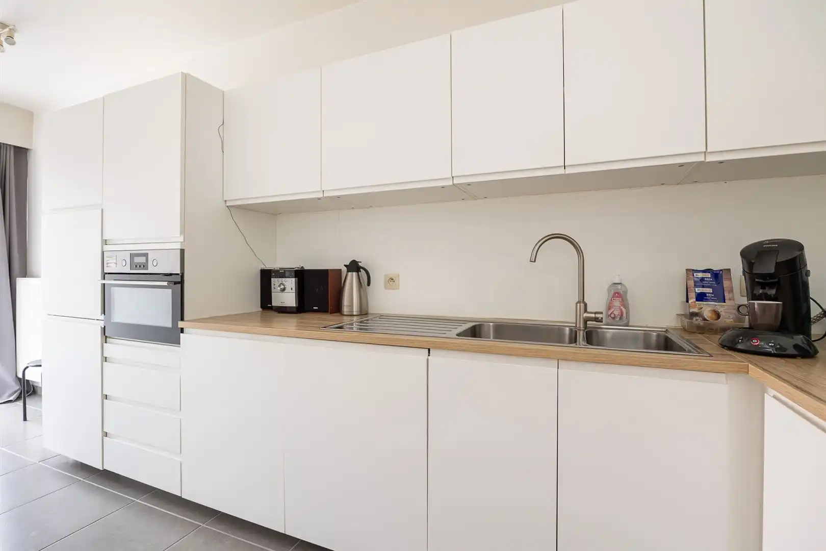 Opbrengsteigendom met 5 appartementen en garages foto 12