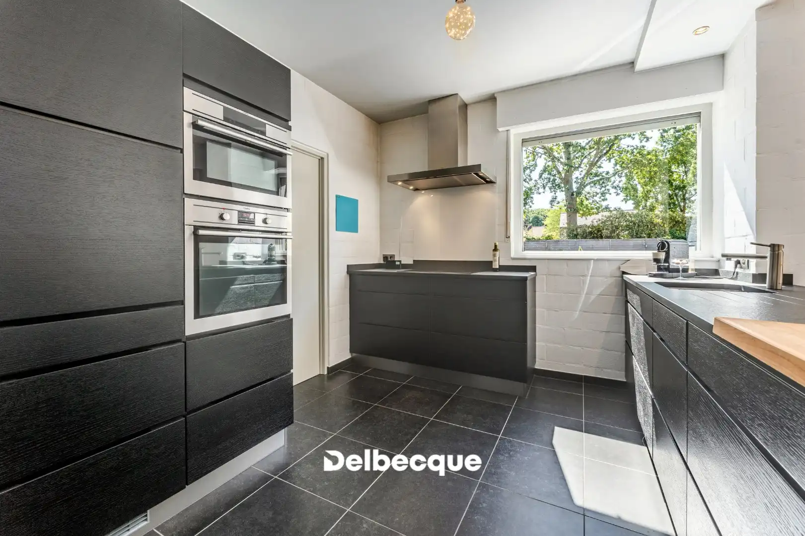 Perfect onderhouden halfopen woning met ruime tuin in residentiële woonwijk te St-Kruis foto 12