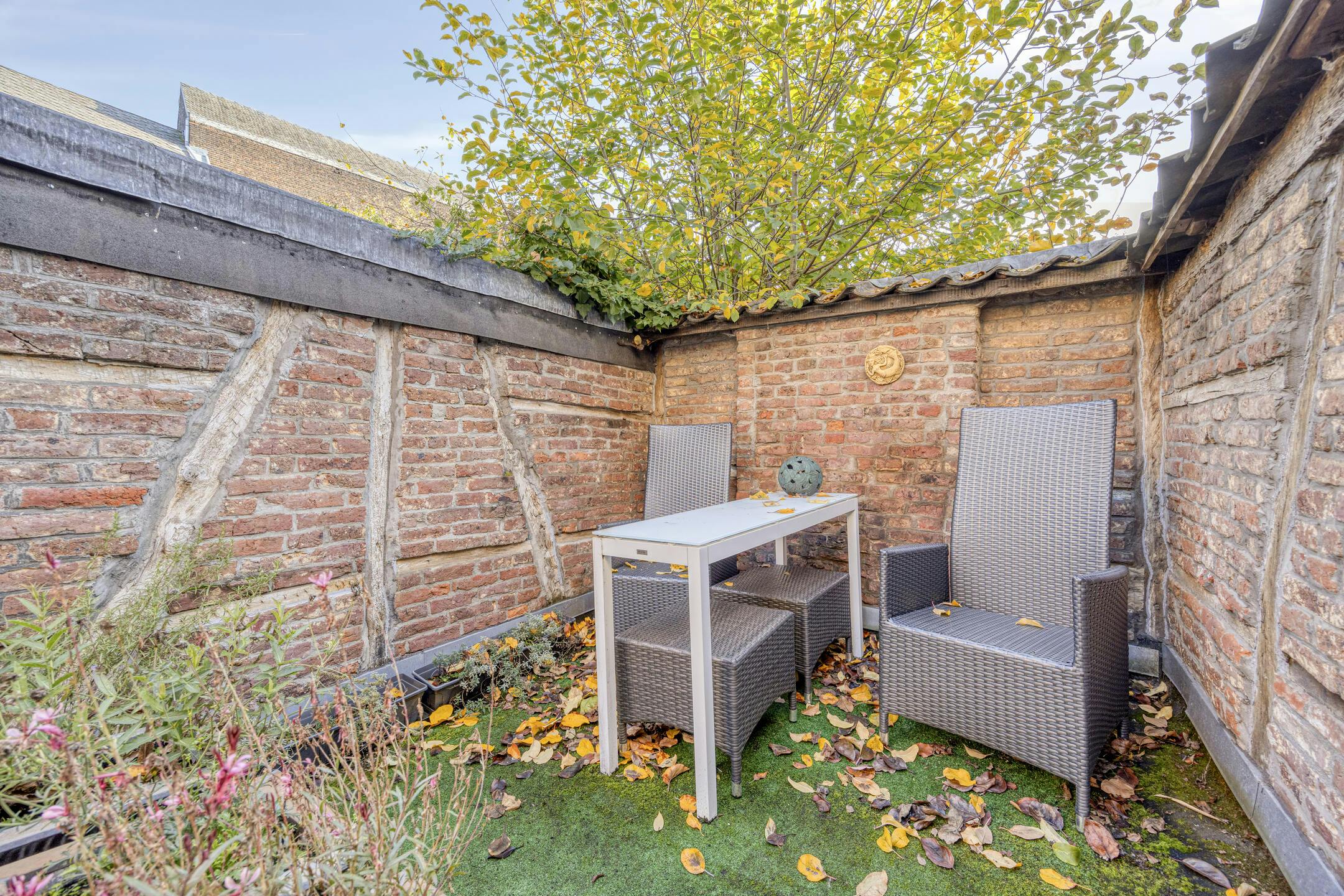 Op te knappen stadswoning met tuin in hartje Hasselt	 foto 16