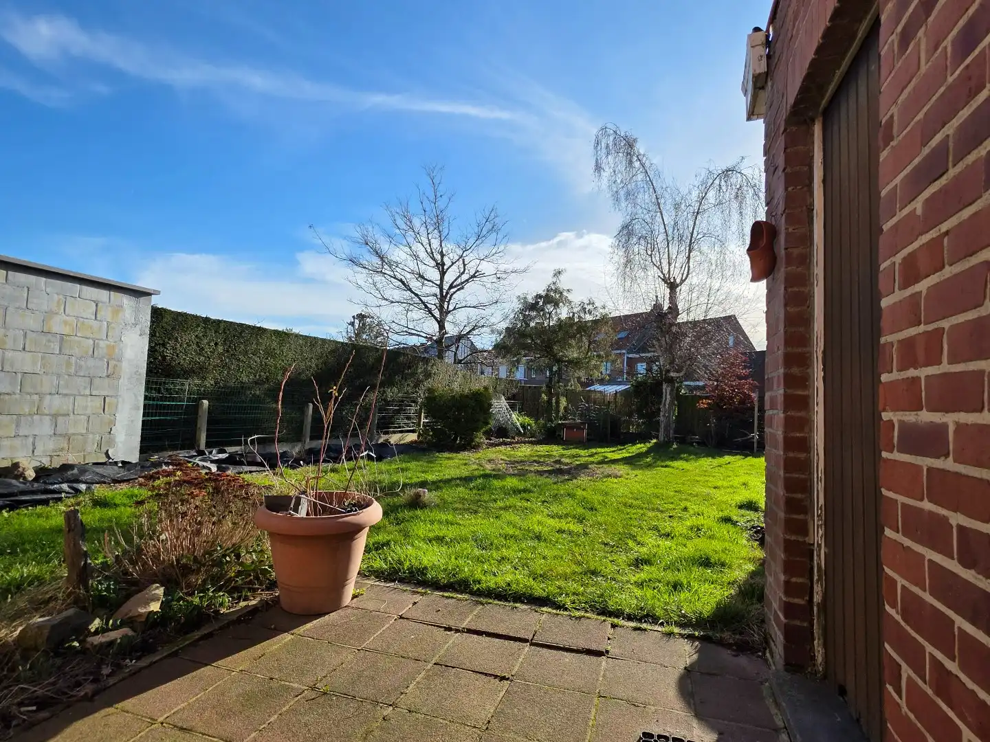 Stevige woning met betonstructuur te koop in Kuurne, eerste verdiep al volledig gerenoveerd foto 21