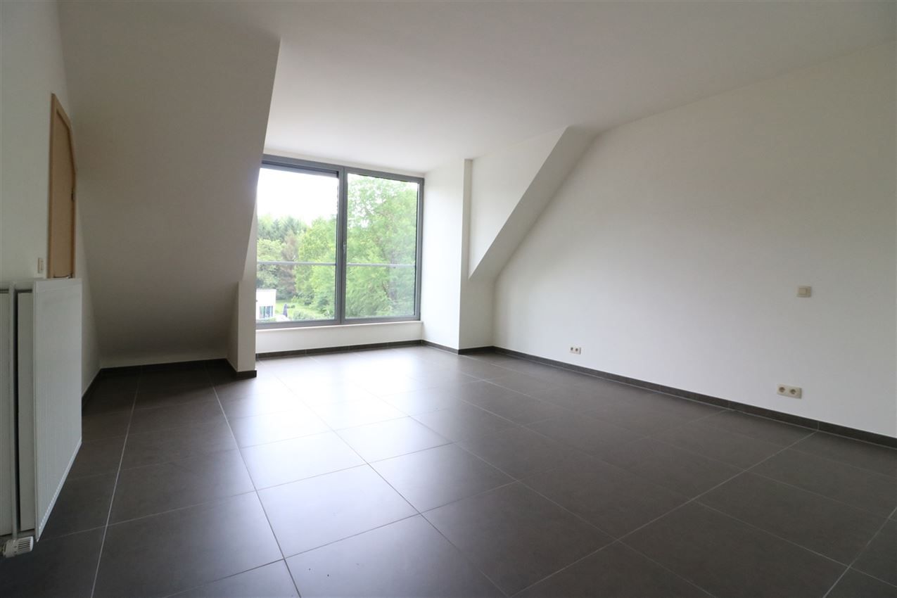 Modern duplex appartement met 2 slpk. en garage foto 17