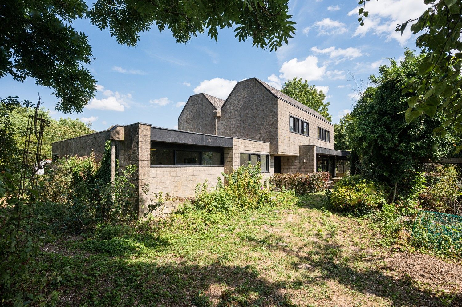 Modernistische parel uit 1978 met brutalistische charme en praktijkruimte op riant perceel in Lembeke foto 37