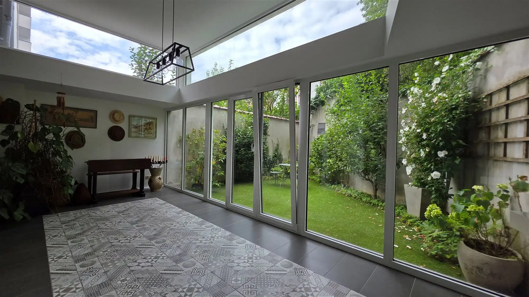 Duplex met tuin en 3/4 slaapkamers foto {{pictureIndex}}