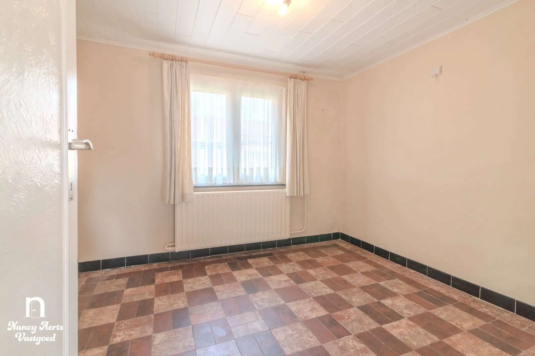 Charmante gezinswoning met mogelijkheden op royaal perceel foto 11