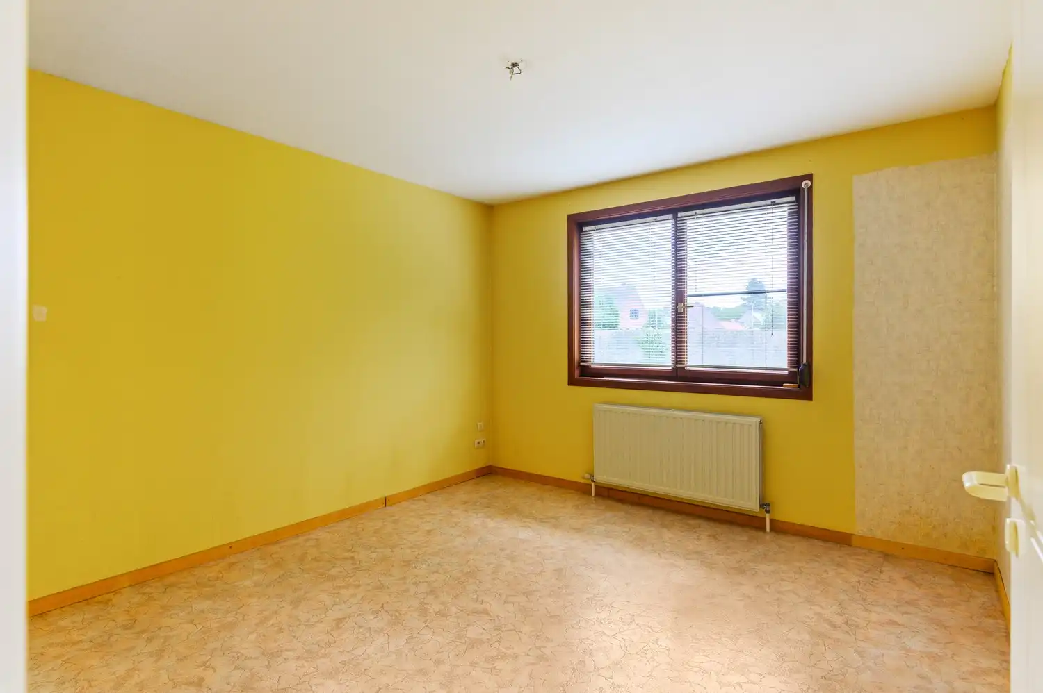 Vrijstaande laagbouwwoning met zonnige tuin en uitbreidingsmogelijkheden in Oelegem! foto 4