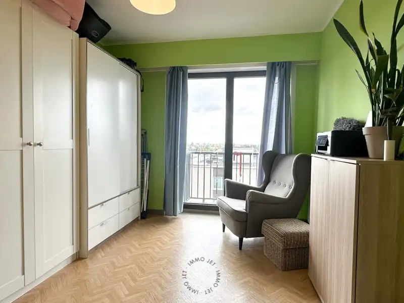 Lichtrijk appartement met twee slaapkamers, terras en ondergrondse autostaanplaats foto 6