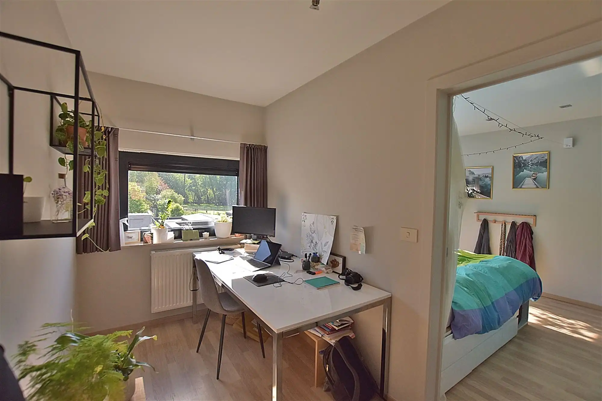 DORPSWONING met 2 slpks, garage/berging & tuin met terras foto 9