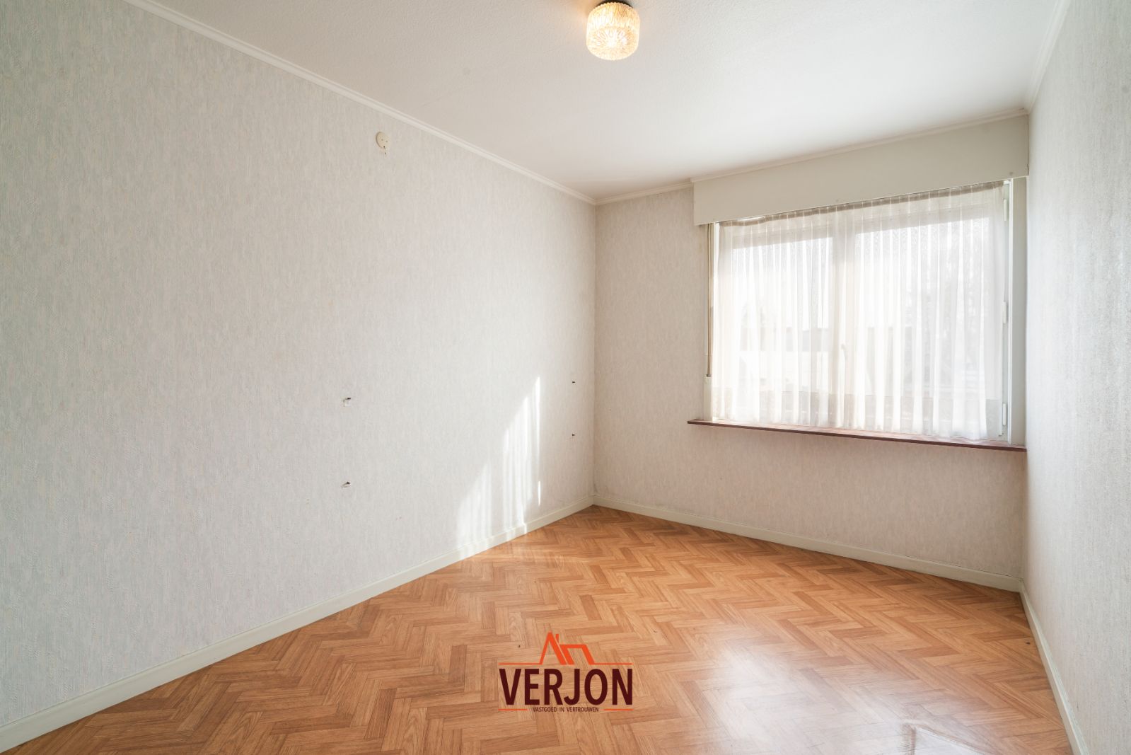 Woning met zuidgerichte tuin te koop in Kachtem! foto 10