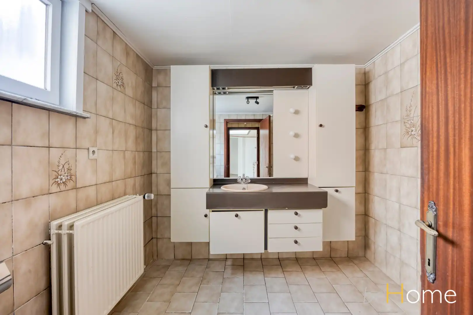 Ideale starterswoning met potentieel in het centrum van Merchtem - Welkom Home! foto 12