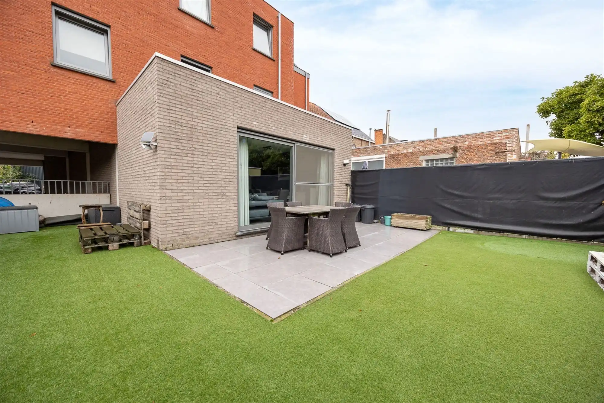 Gelijkvloers appartement met ruime tuin foto 10