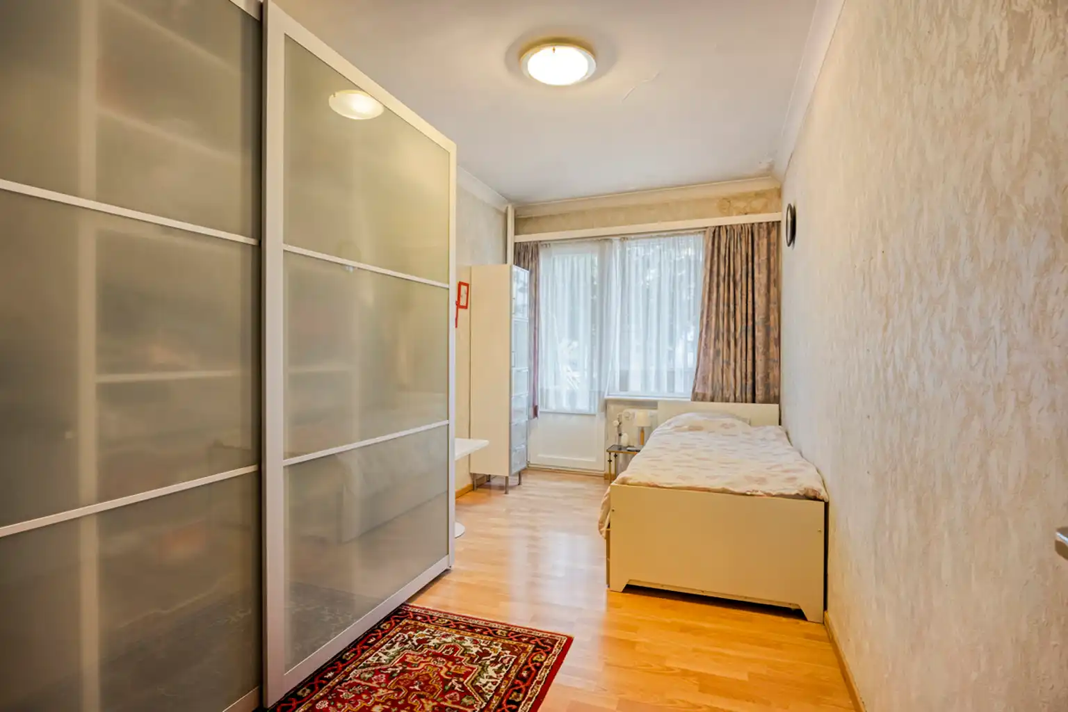 Instapklaar en lichtrijk 2-kamerappartement met garagebox  foto 16