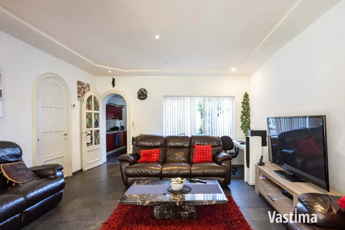 Instapklare stadswoning met 3 slaapkamers, 2 badkamers en tuin foto 3