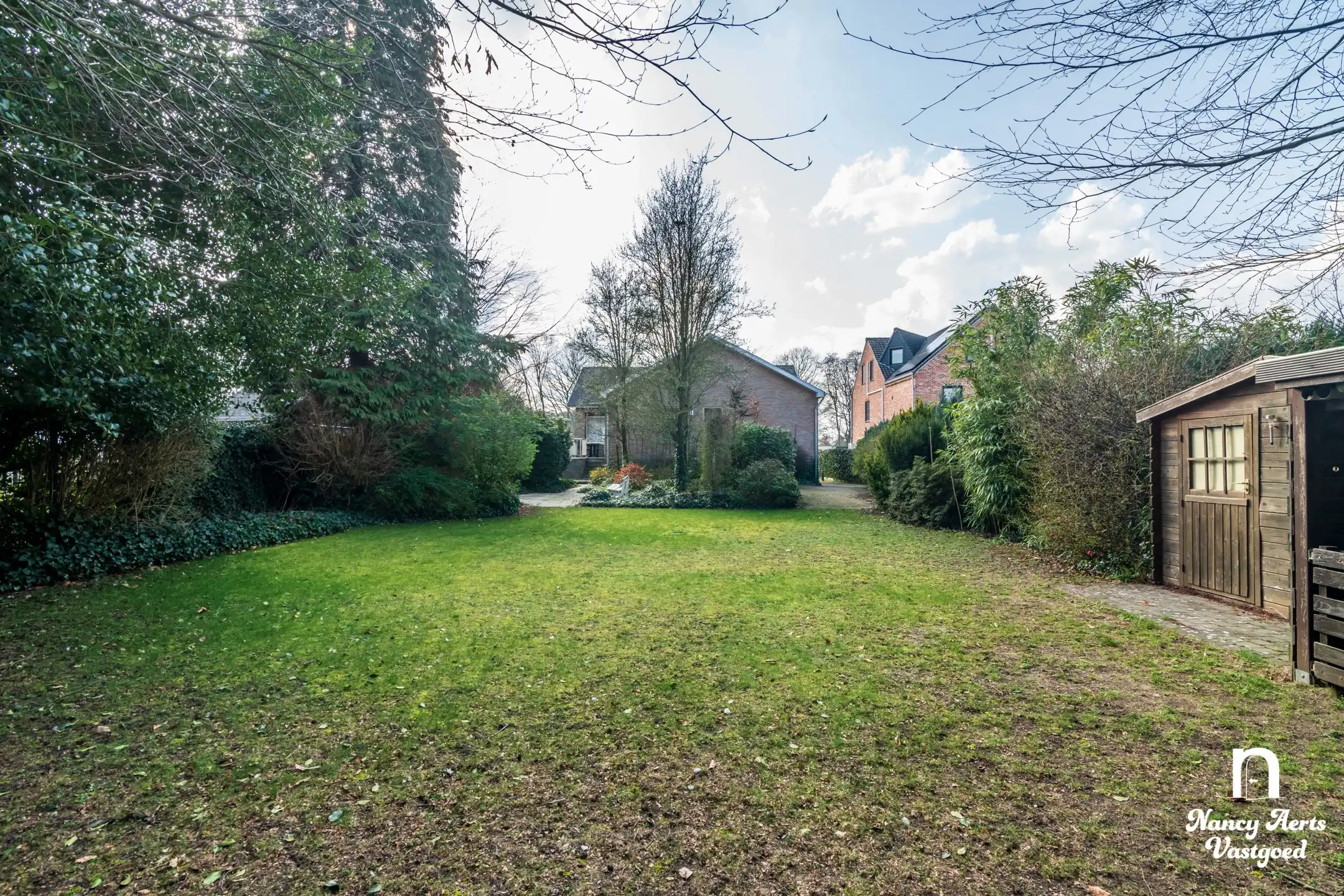 Goed onderhouden gezinswoning met grote tuin foto 32